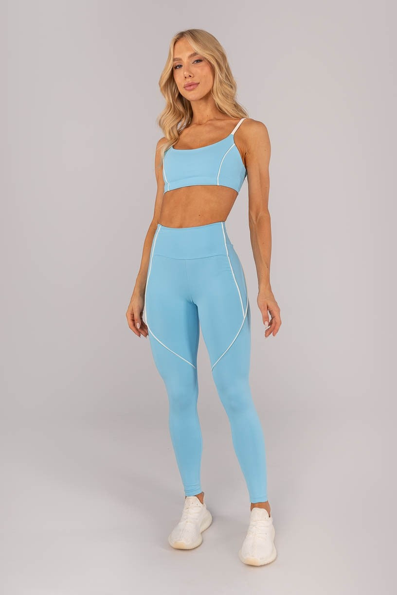Calça Legging com Bolso e Vivo nas Laterais (Azul Céu / Off-White) | Ref: K4589-A